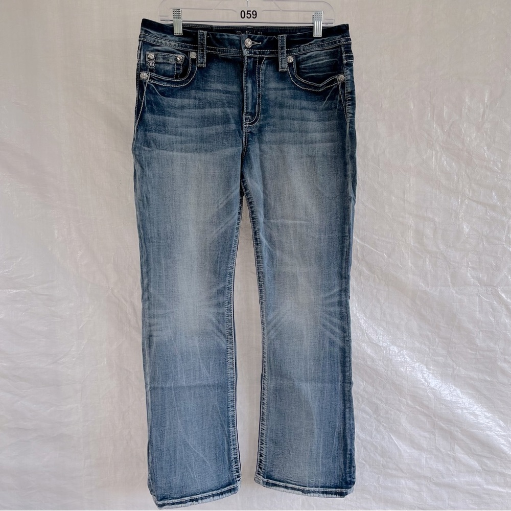Miss Me Curvy Boot Jeans. Size 31 . 31x30 30 inch inseam. Star details.